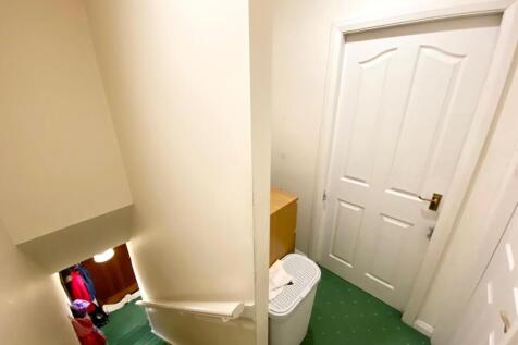 TO THE FIRST FLOOR LANDING