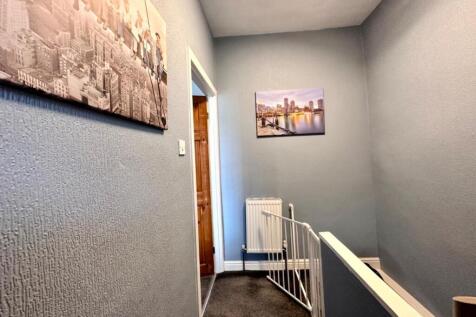 TO THE FIRST FLOOR LANDING