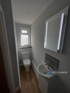 Utility Room With Separate Toilet