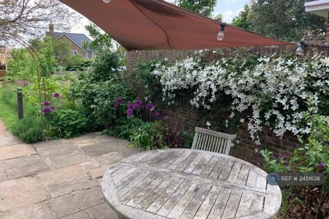 Flowers By The Patio