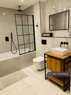 Bathroom With Shower Over Bath