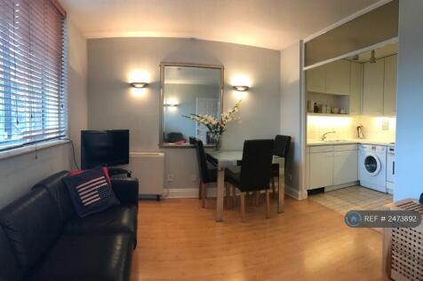 Living Area With Robin Day Forum Leather Sofa