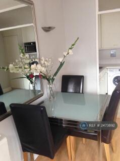 Large Extendable Glass Dining Table