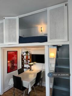 Living Room With Mezzanine Sleeping Area