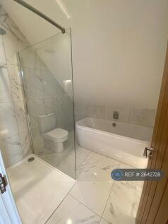 Bathroom With Shower, Bath &amp; Toilet