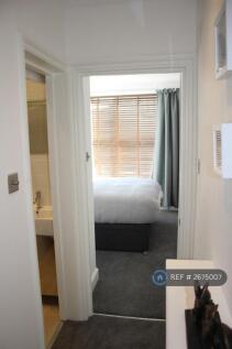 Hallway Looking Into Front Bedroom