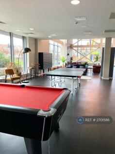 Communal Living Area With Games Tables