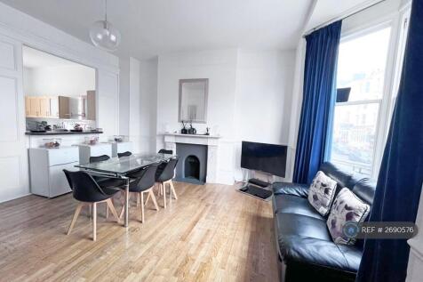 Living Room: Dining Seating For 8, 2 Large Sofas