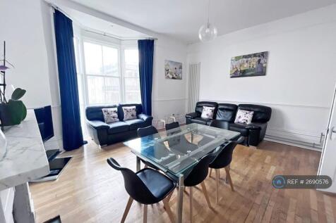 Living Room: Dining Seating For 8, 2 Large Sofas