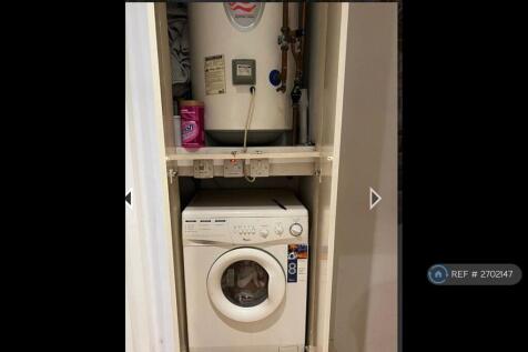 Washing Machine And Hot Water Tank