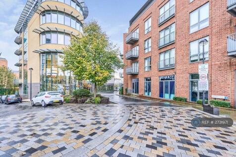 View Of Road Leading To Car Park