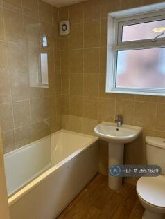 Family Bathroom With Overhead Shower