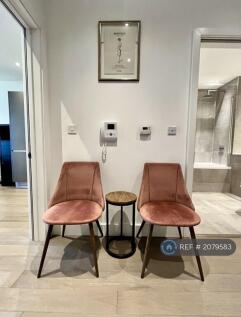 Internal Hallway With Seating And Intercom