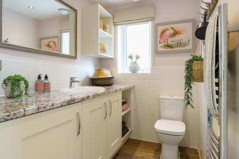 Handy cloakroom and utility room with laundry space