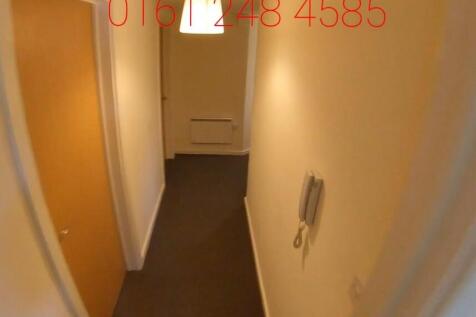 Narrow internal hallway with a fitted carpet, n...