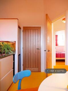 Kitchen Looking At Utility Cupboard Door 