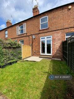 Enclosed Garden With Lawn And Patio Area