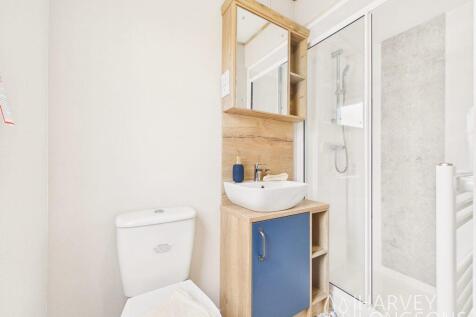 ABI Ticehurst family shower room with vanity and t