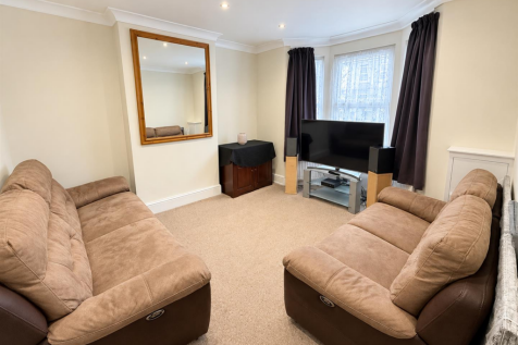 Bright Modern Living Room with Bay Window.png