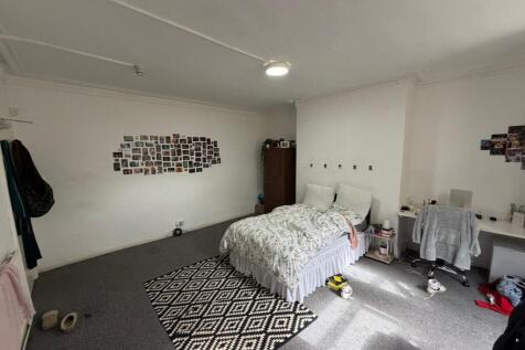 Expansive bedroom with a great study workspace....