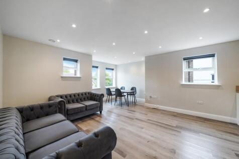 Spacious modern lounge with stylish sofas...