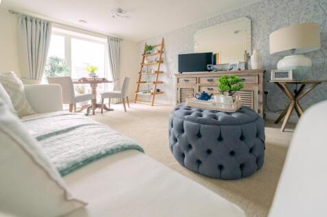 a bedroom with a bed and a fireplace