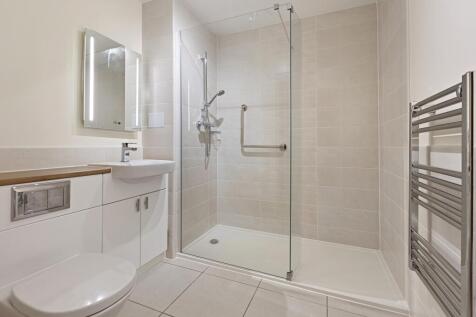 a bathroom with a glass shower