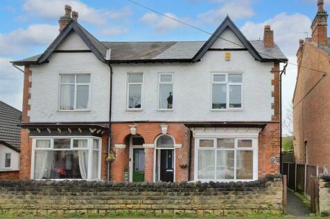 Charming traditional semi with large windows...