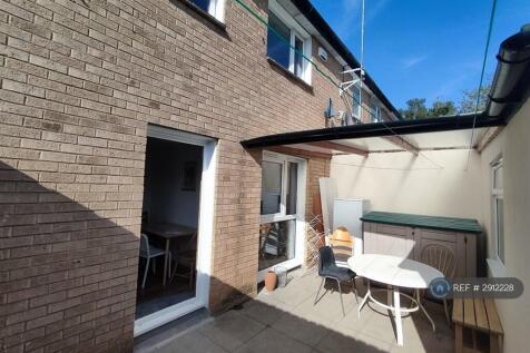 Back Garden With Storage Outbuilding
