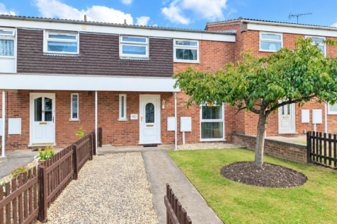 Bright Terraced Houses with Front Gardens.png