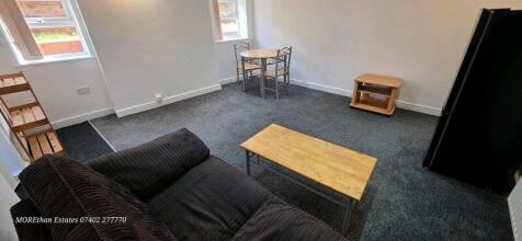 Bright and spacious lounge with dining area...