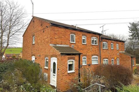 Charming red brick home with a leafy garden...