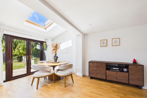 Tidied dining area with sideboard-1.png
