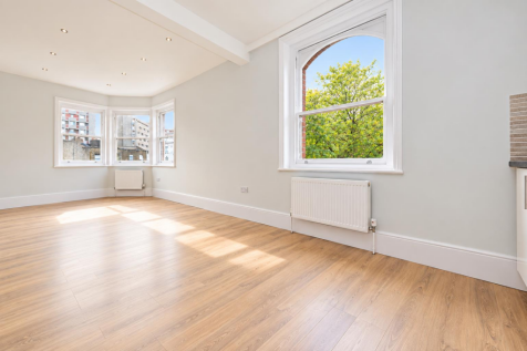Sunlit minimalist apartment interior.png