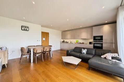 Reception/kitchen/dining area