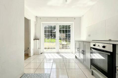 Bright, spacious kitchen with garden access...
