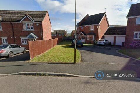 End-Of-Terrace Red Brick Home With Red Front Door.