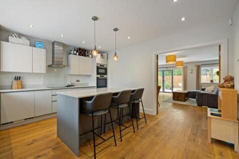 Kitchen through to living room