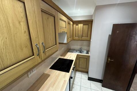 Bright kitchen with classic oak cabinetry...