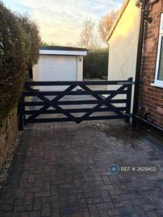 Gated Drive And Garage 