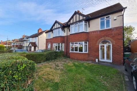 A clear view of the front exterior of a charmin...