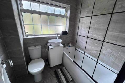 Modern bathroom with bath and shower