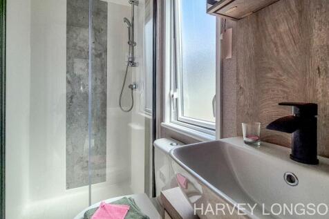 Modern bathroom with bath and vanity unit