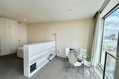 open plan living room into bedroom beautiful views