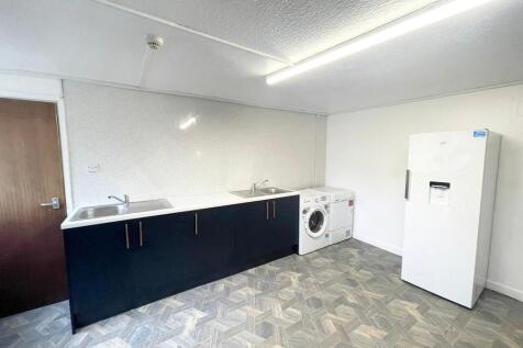 Bright laundry room with modern appliances...