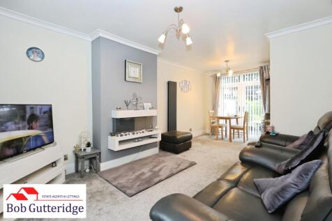 THROUGH LOUNGE / DINING ROOM