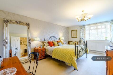 Bedroom With Wardrobes And Ensuite Shower Room