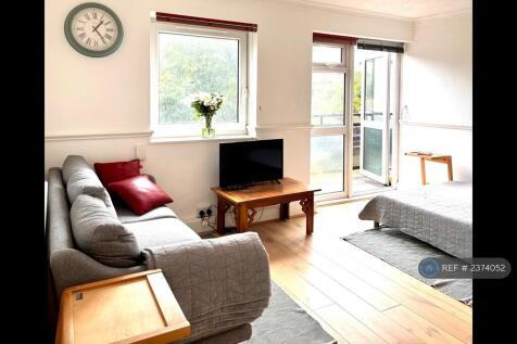 Bed 1/Living Room. Balcony.