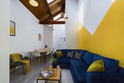 A stylish and spacious modern living room, perf...