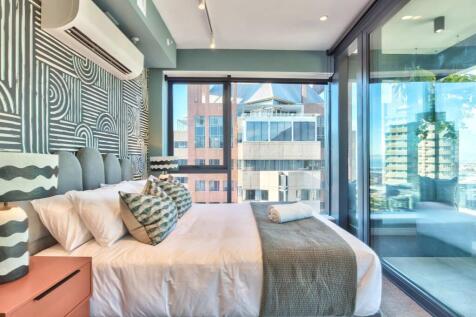 Bedroom 1 on second floor of penthouse with private daybed